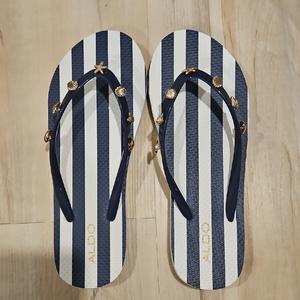 Aldo Navy and White Striped Flip Flops with Gold Shell Accents